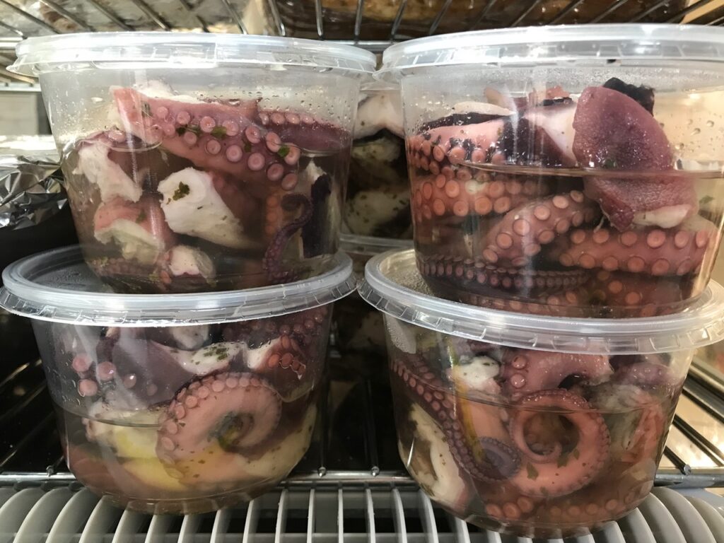 Octopus salad in containerss