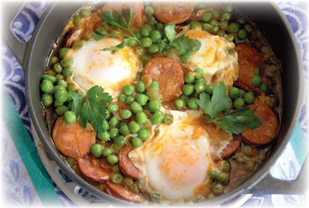 Maria Lawton's Stewed Green Peas with Chourico and Poached Eggs