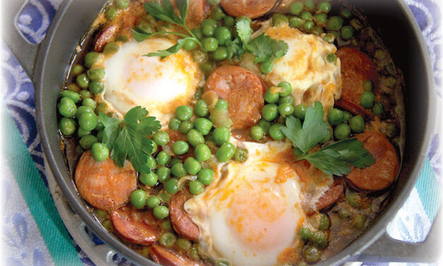 Maria Lawton’s Stewed Green Peas with Chourico and Poached Eggs